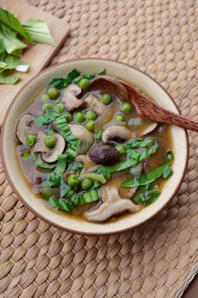 Vegan Miso Soup with Mushrooms, peas, onions and Pak ahoi (Shiro Miso) in a Bowl